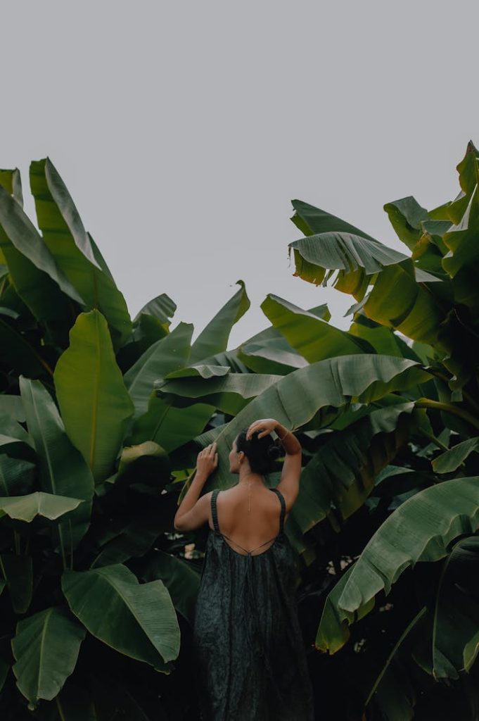 A Woman in a Green Backless Dress